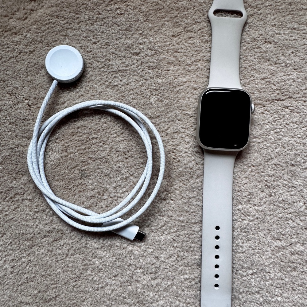 Apple watch, series 9; 45mm with M/L band in color Starlight